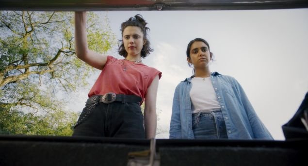 ‘Drive-Away Dolls’ Review: A Queer Road Trip Without Forward Motion